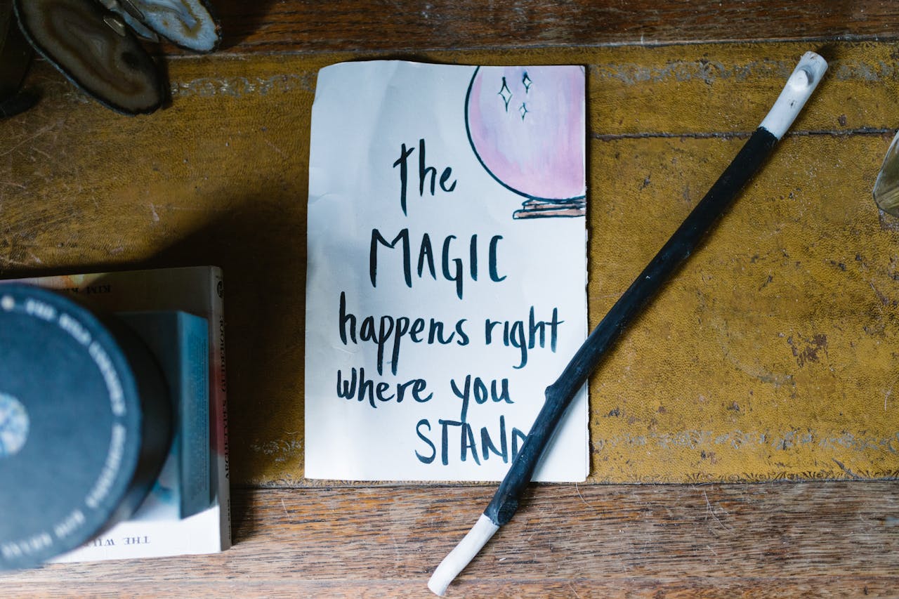 hero-img-02 An inspiring quote on magic and belief with a wand, perfect for spiritual and mystical themes.